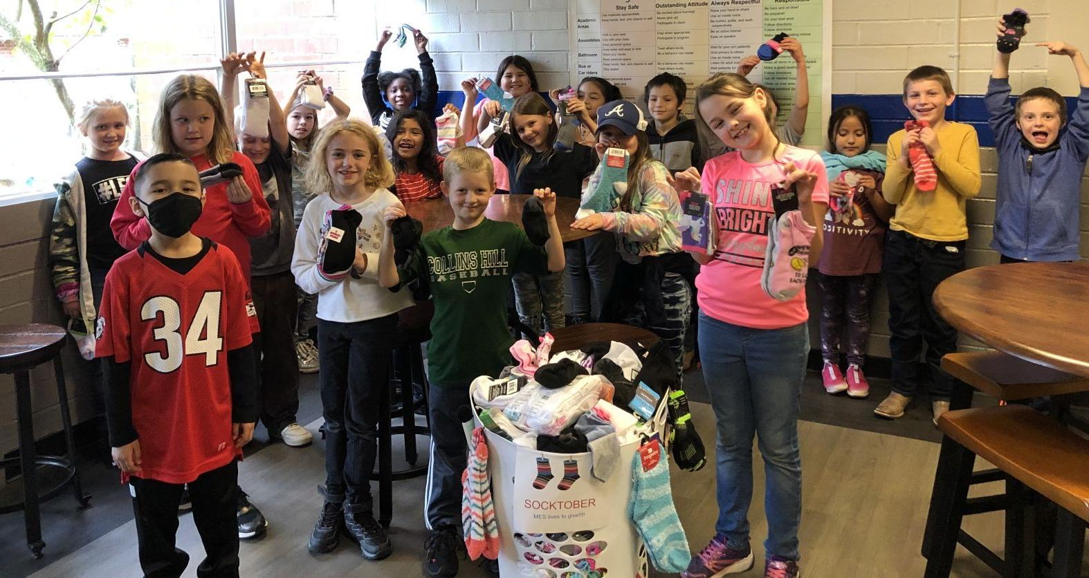 MES STUDENTS COLLECT DONATIONS